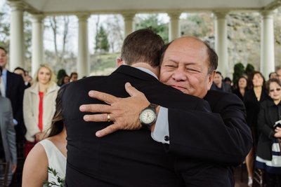 Happy Father Hugs Son-in-law Candid Photography