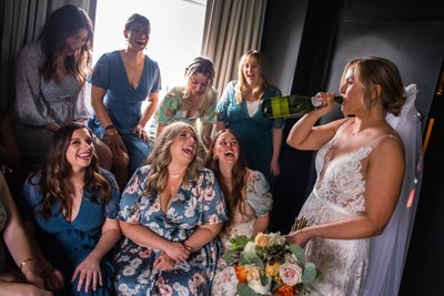 Bride and Friends Laugh Before the Philadelphia Wedding