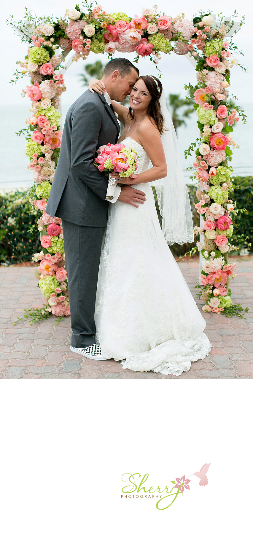 LBMA flower arch groom bride