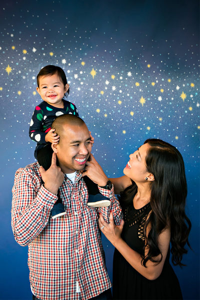 starry wall family portrait