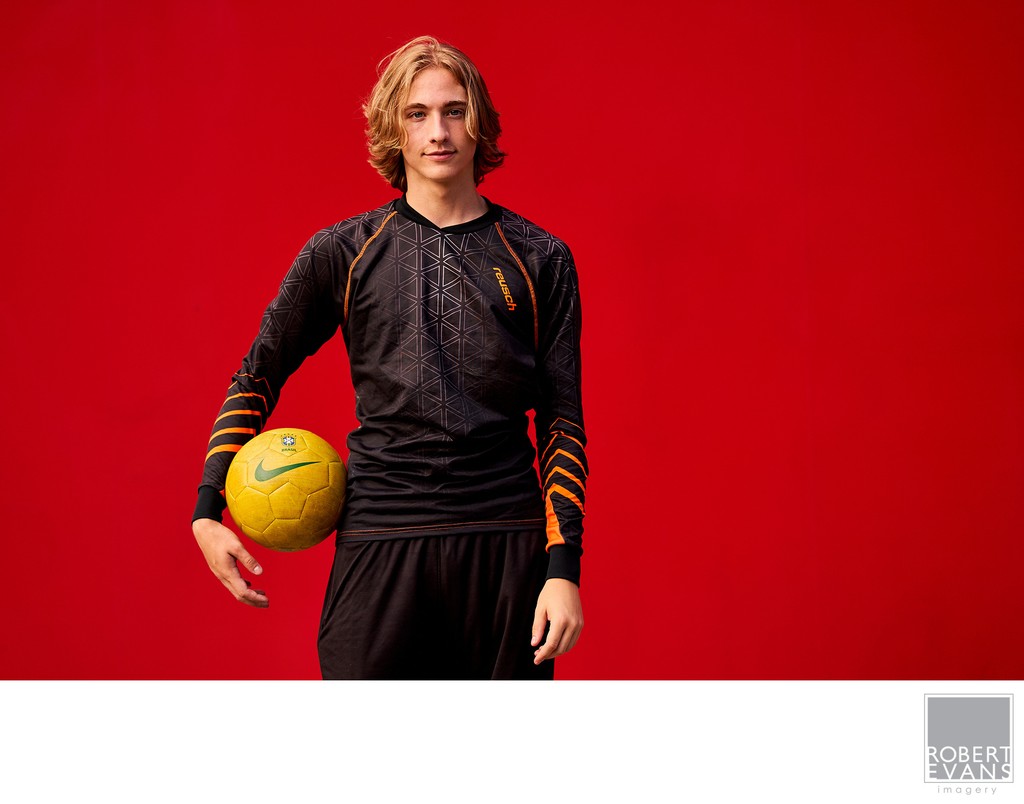 This soccer themed senior portrait was taken in the middle of downtown Minneapolis