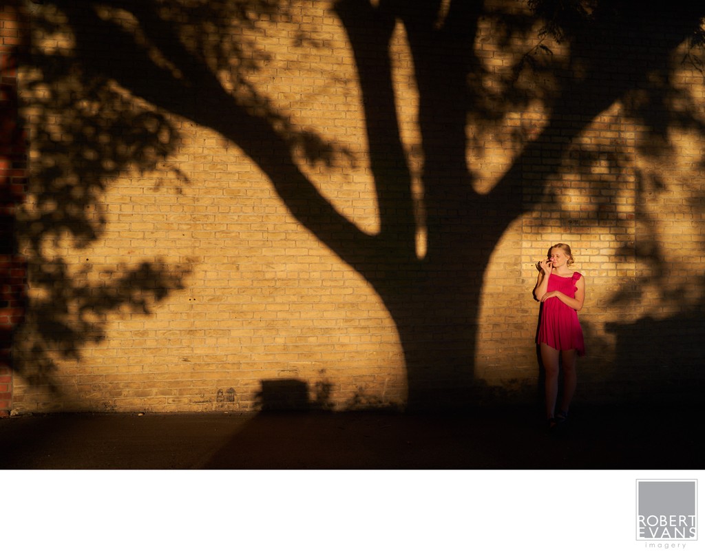 Senior Portrait in the shadows Downtown Chaska Minnesota