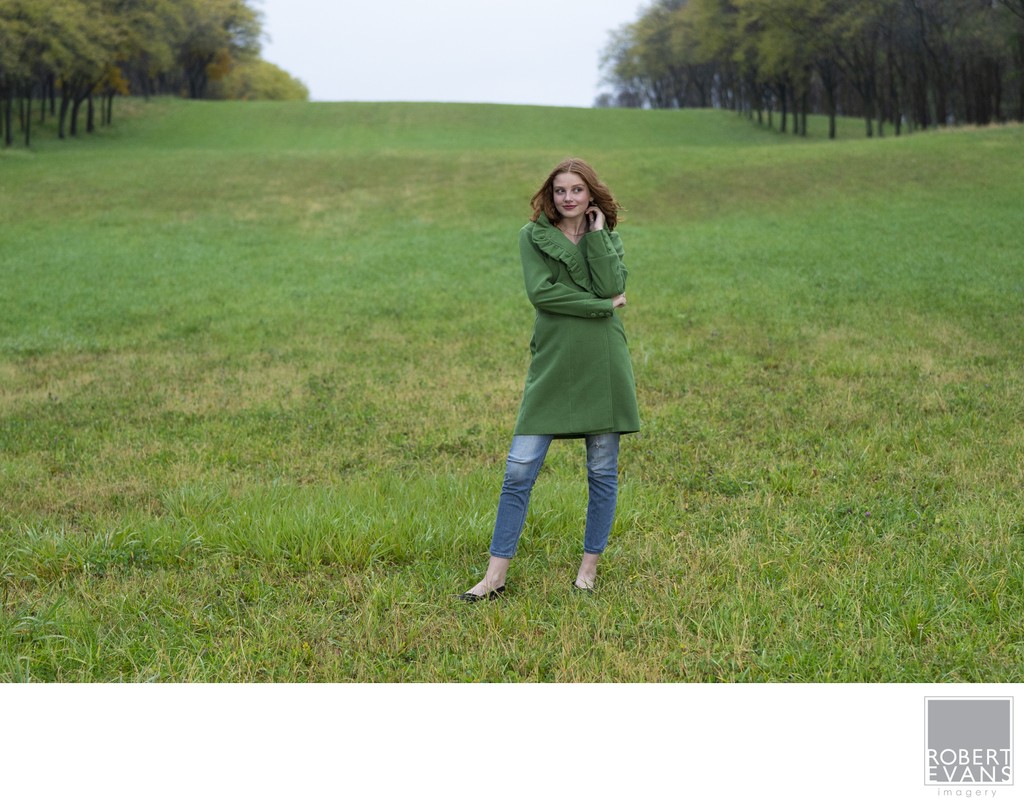 Using backgrounds with complimentary colors matching your subjects senior portraits wardrobe