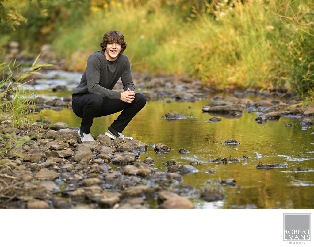  Minnetonka High School Senior along the creek near his home