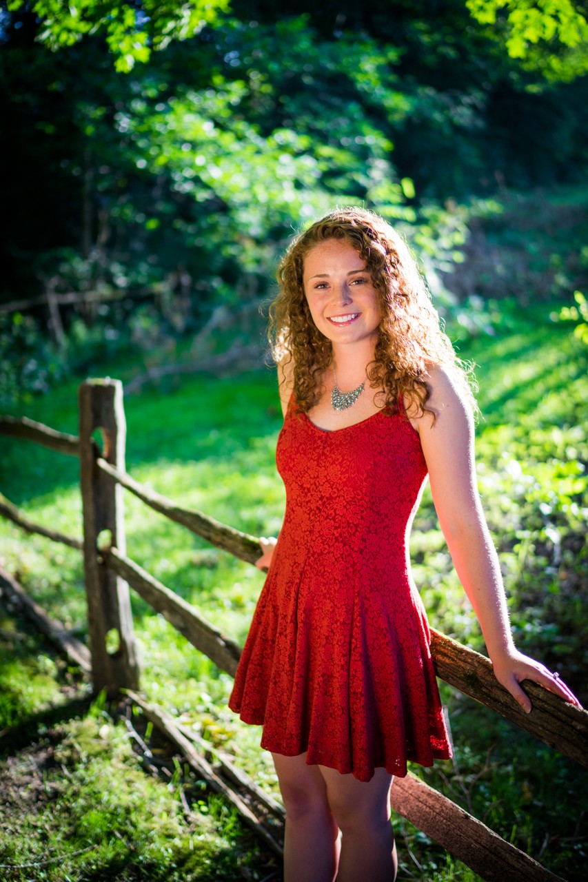 Orono High School Senior Portrait backlit by the Sun