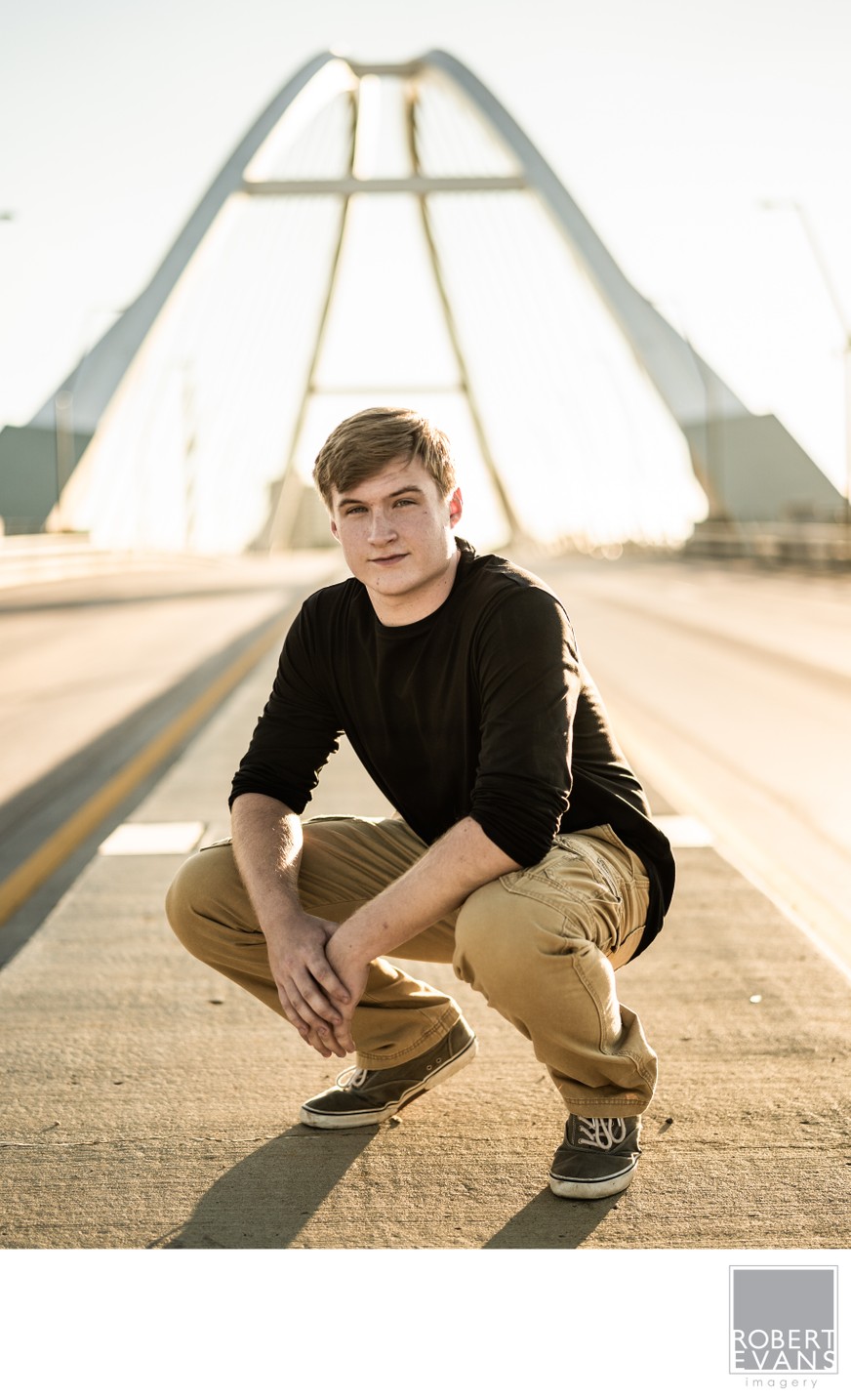 The Lowry Avenue Bridge worked well as masculine background for male senior high school portrait. 