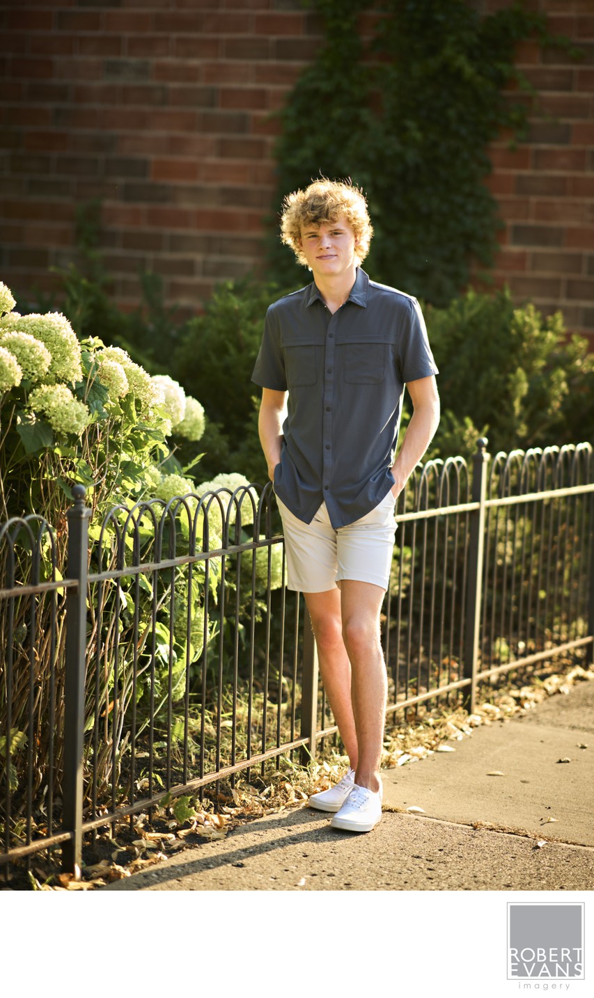 This relaxed senior portrait in an urban setting on the streets of Waconia