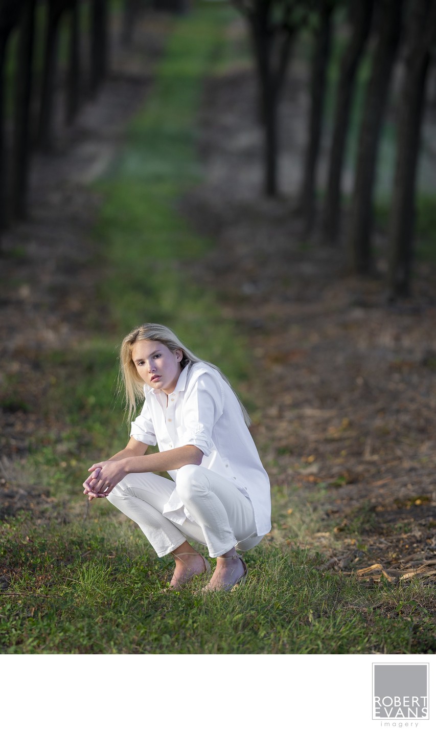 A fashion inspired portrait shoot of a girl dressed in all white