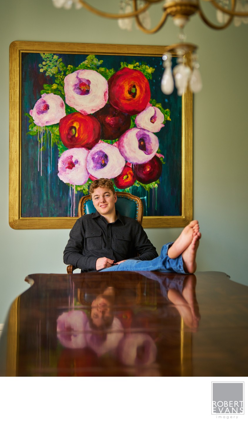 Senior Portrait at home with a favorite piece of art