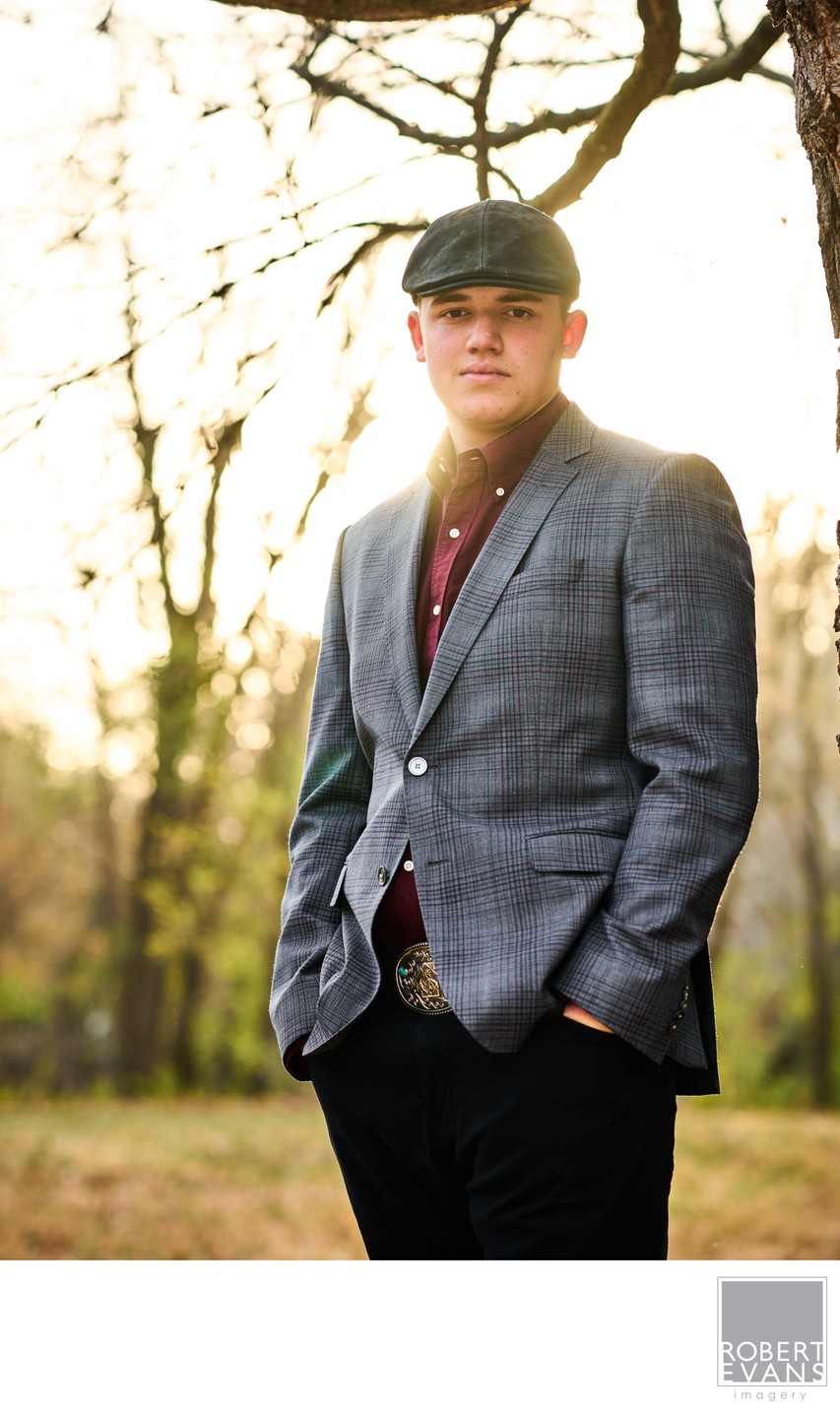 Stylish senior wearing a drivers cap and a grey sports coat