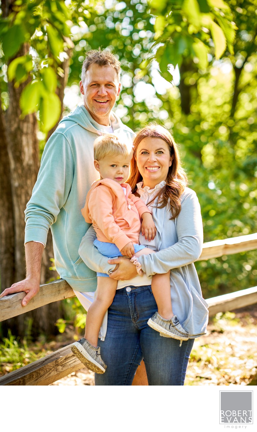 Parents with young child outdoors