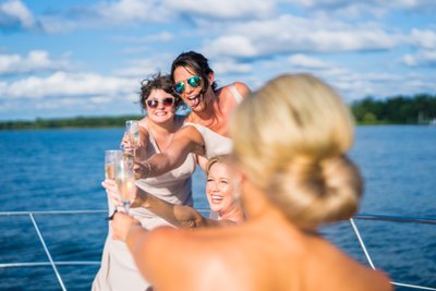 Lake Minnetonka Wedding Bride Toasting With Her Besties 
