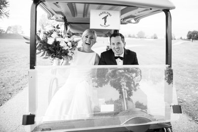 Bride and Groom Wedding Candid in Golf Cart at Hazeltine National Golf Club