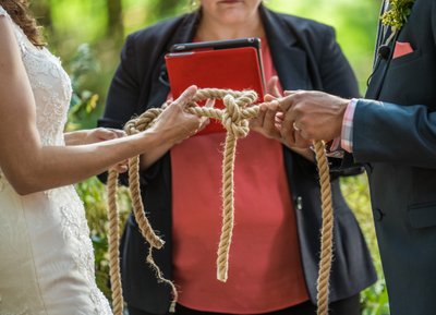 Bride & Groom Tying The Knott- Literally- during their Wedding 