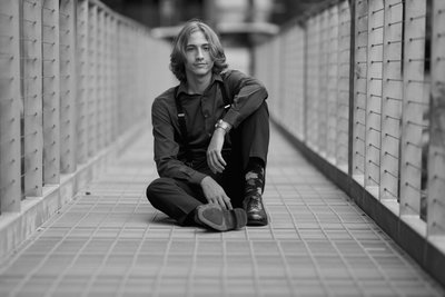 Depth of field bring you right to this male subjects urban senior portrait.