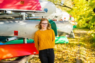 This beautiful Fall senior portrait has more than colorful leaves as a backdrop.