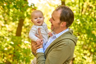 Father holding baby
