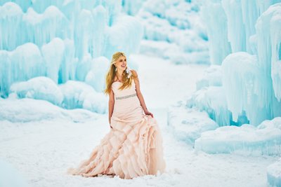 Ice Castle Wedding Photography of this stunning bride in a light pink wedding dress. 