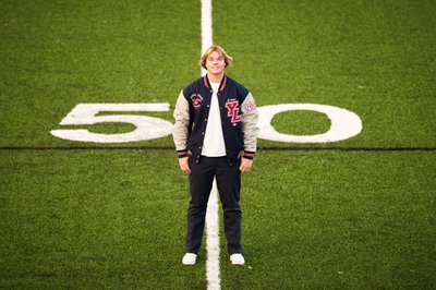  Football Player Senior portrait  wearing his Letterman's jacket, Chanhassen Minnesota