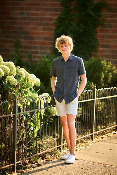 This relaxed senior portrait in an urban setting on the streets of Waconia