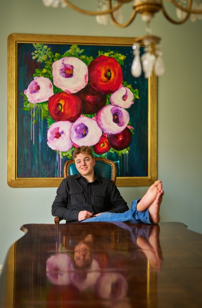 Senior Portrait at home with a favorite piece of art Edina Minnesota