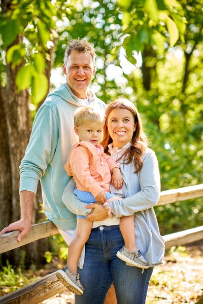 Parents with young child outdoors