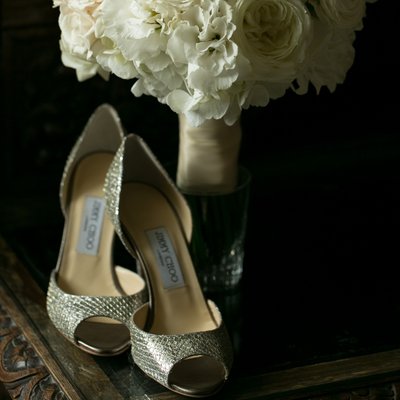 jimmy choo shoes and white wedding flowers