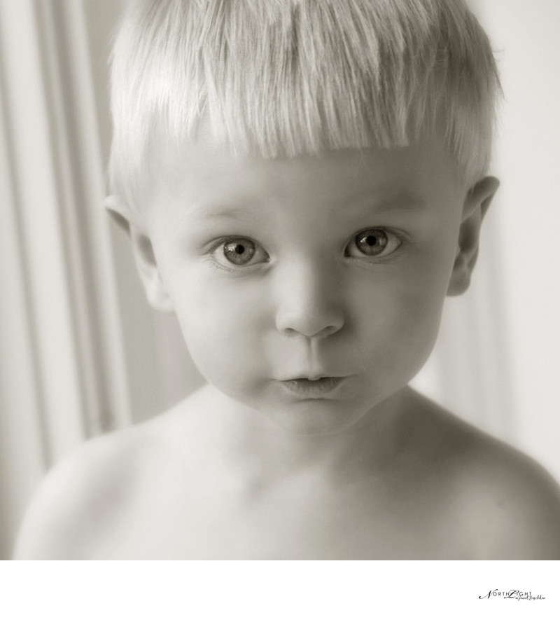 Expressive Black and White Photo of a Boy