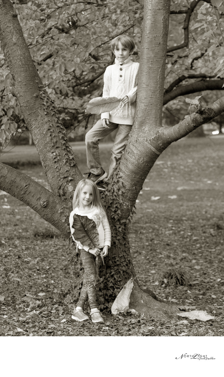 Boy and Girl Photograph in Tree at Park B&W