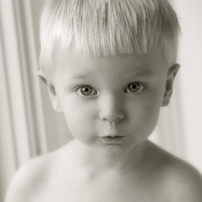 Expressive Black and White Photo of a Boy