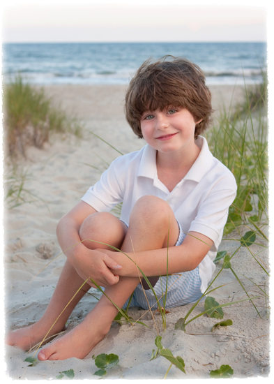 Boy sitting in the sand, Holden Beach, NC by Northlight