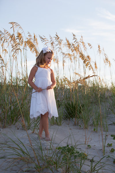 Sunrise portrait of a young girl at Sunset Beach NC