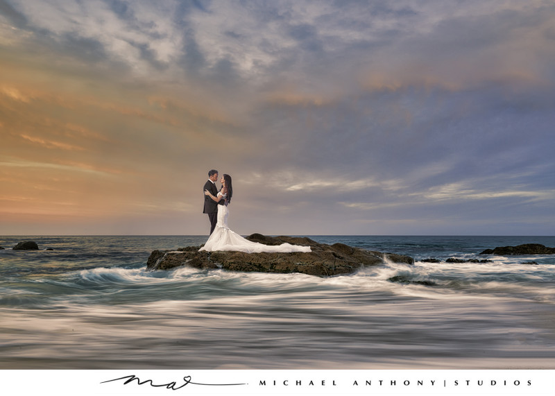 Bride and Groom posing on a Beach in Cabo