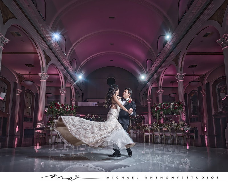 Bride and Groom Dance in Beautiful Reception Hall