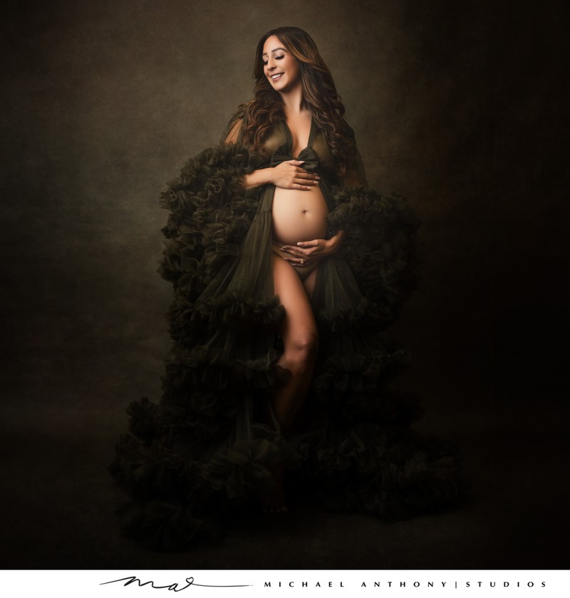 Elegant Maternity Portrait with Dark Textures