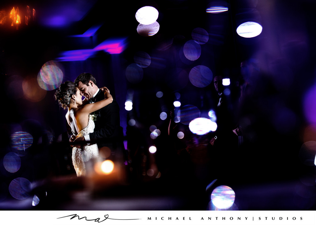 Creative First Dance Photo of Bride and Groom Embracing