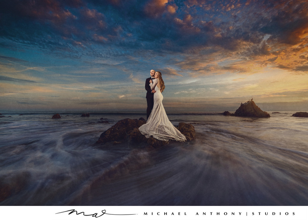 Wedding Couple poses on Beach at High Tide