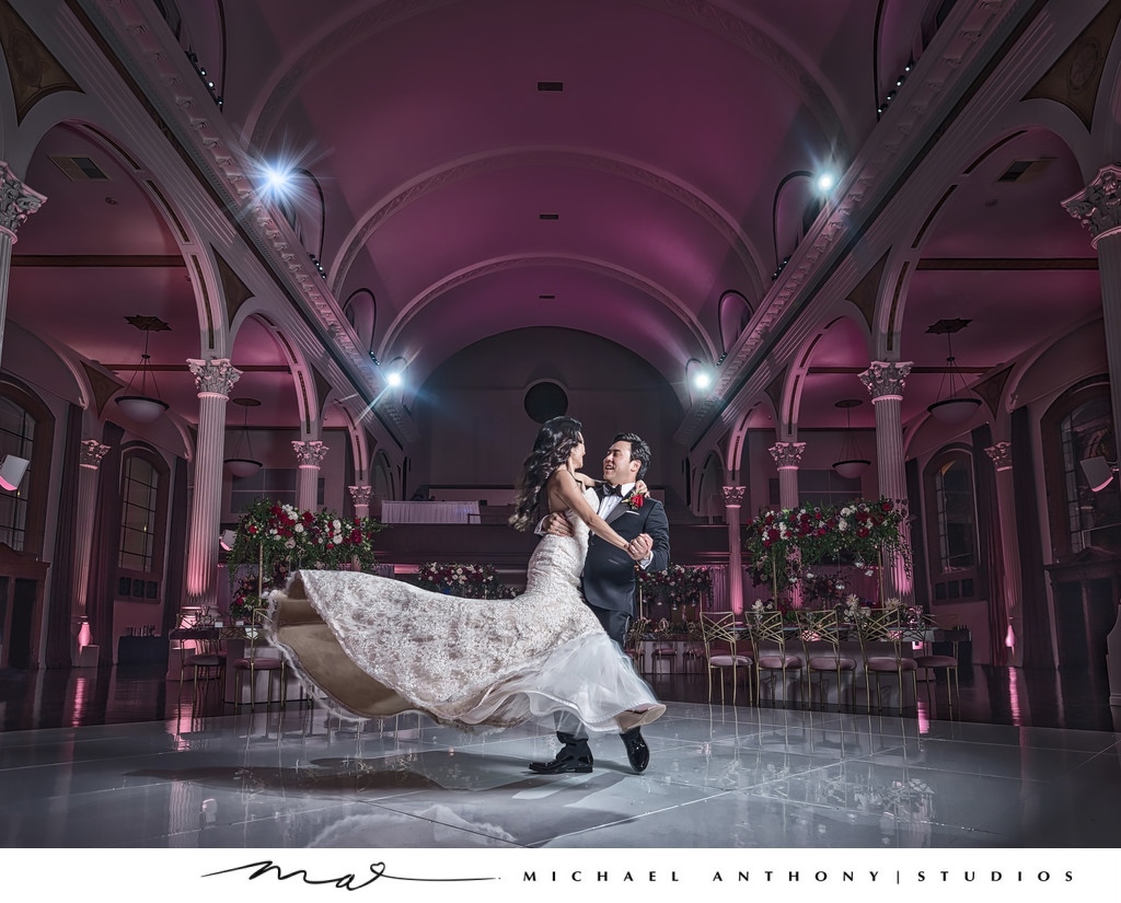 Bride and Groom Dance in Beautiful Reception Hall