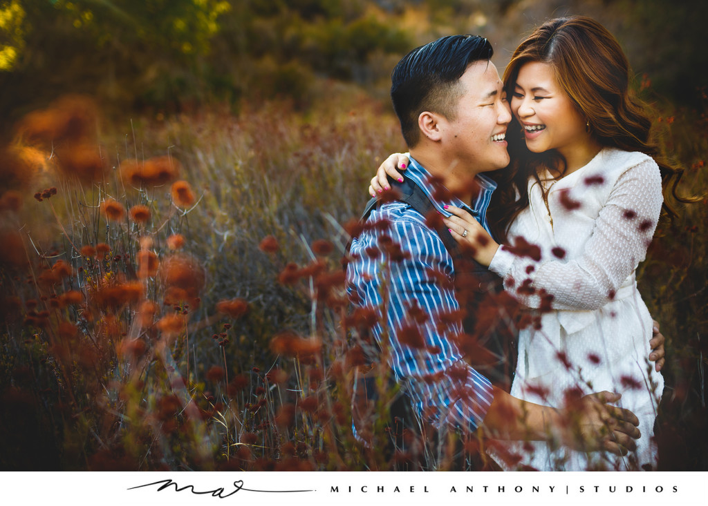 Couple sitting during Engagement Session at Park