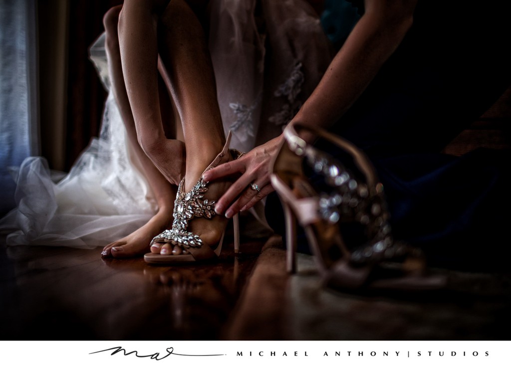 Bride puts on Shoes Before Wedding