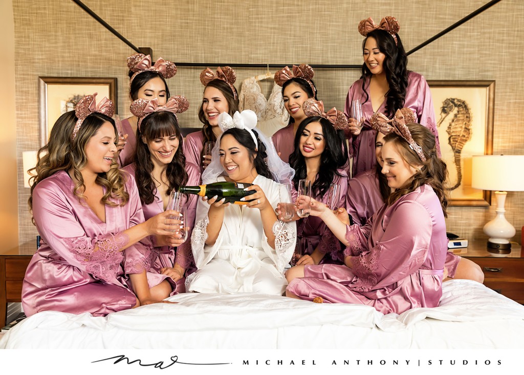 Joyful Bridal Party Celebrating with Champagne