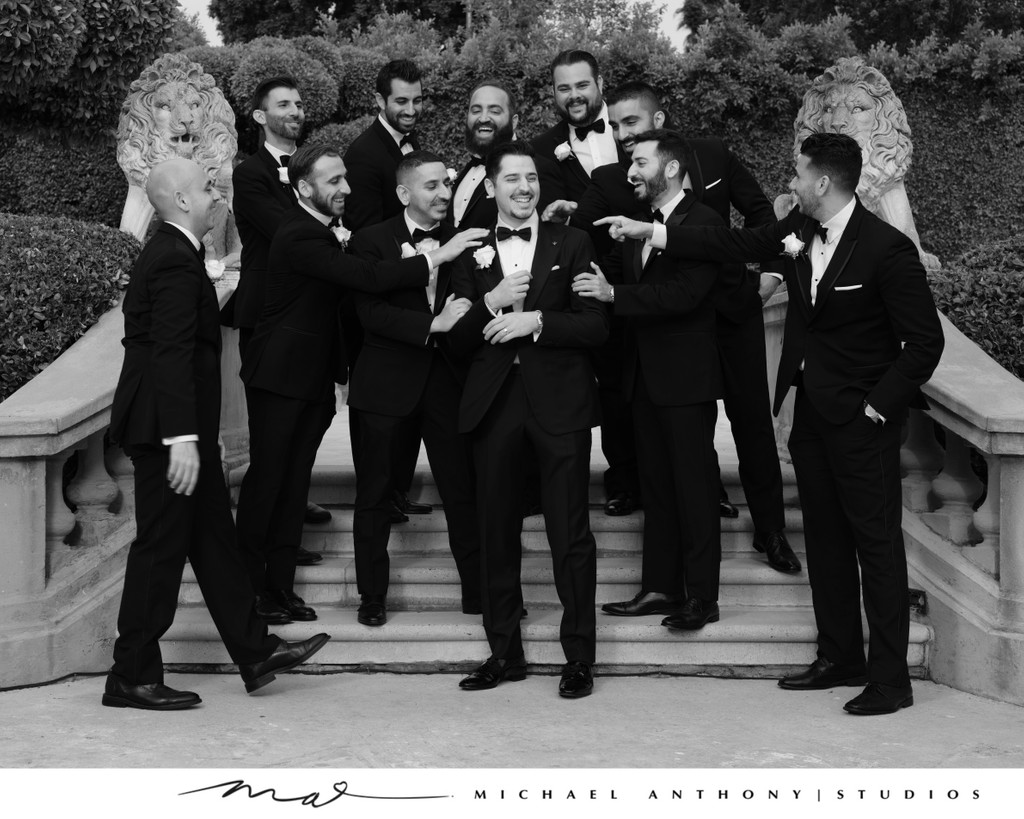 Groomsmen Laughing with the Groom at Estate