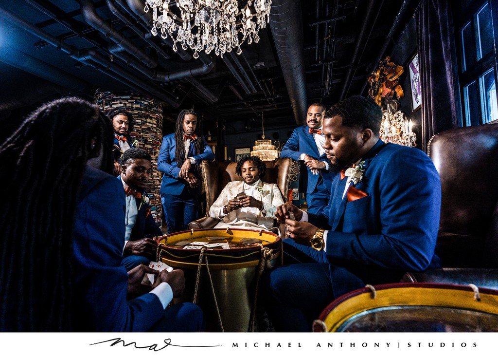 Groom and Groomsmen Relaxing with a Game of Cards Before the Wedding