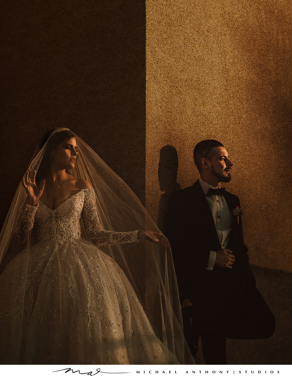 Bride & Groom Posing against Dallas Building in Sunlight