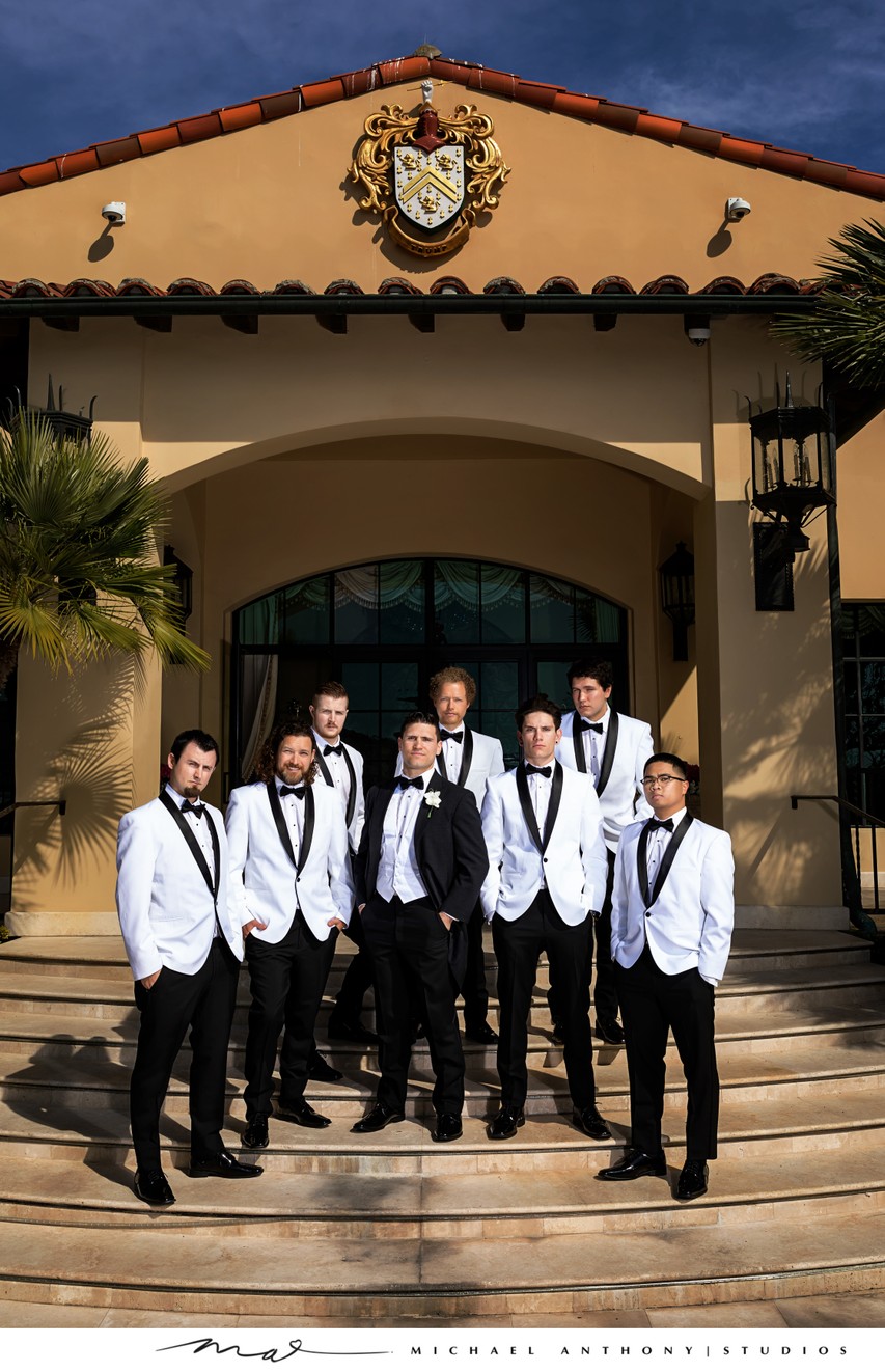 Dapper Groomsmen in Black and White Tuxedos