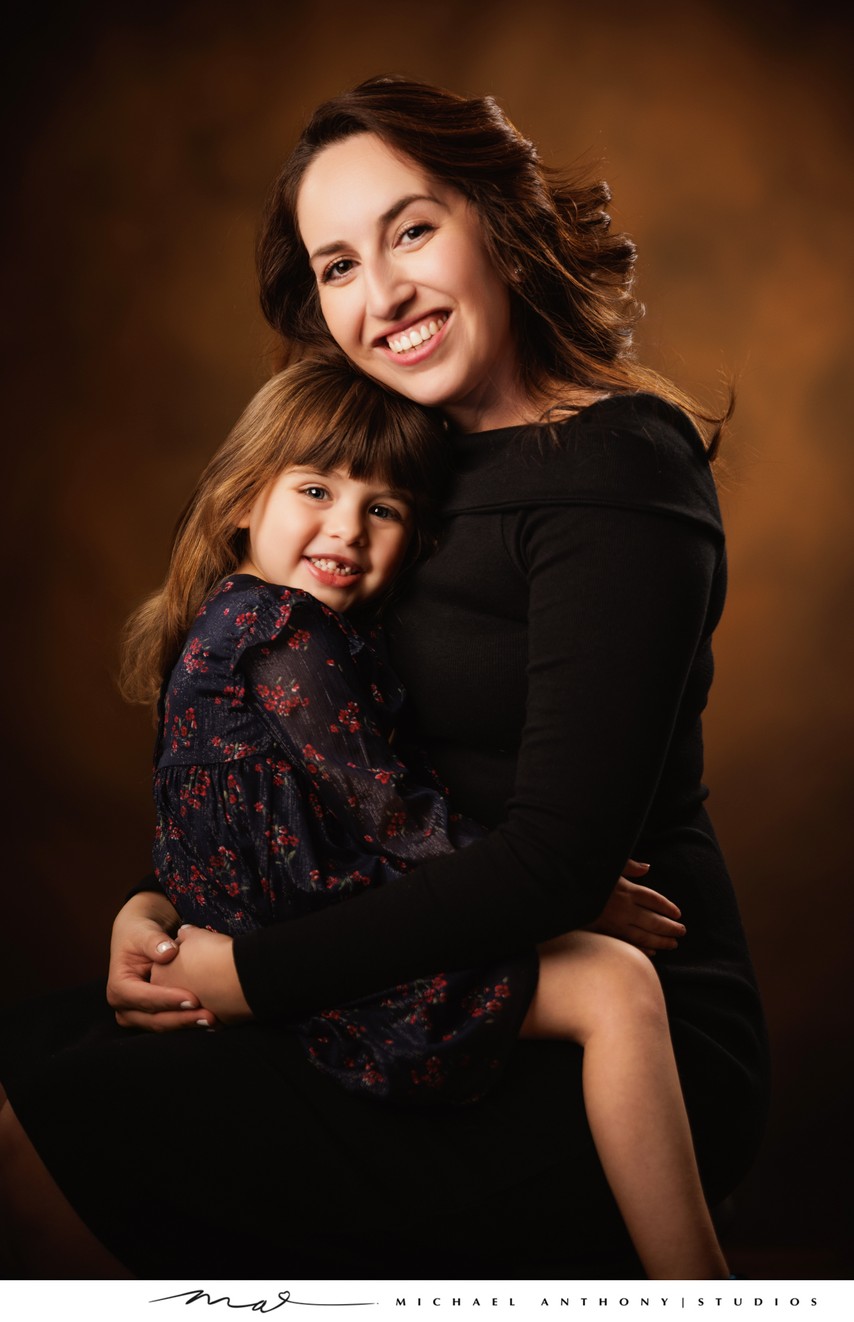 Mother and Daughter Embrace in Dallas Studio Portrait