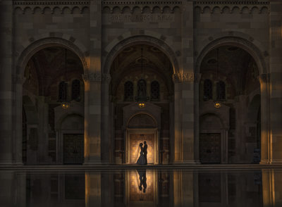 Silhouette of Wedding Couple Standing in Front of Building