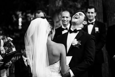 Groom Laughing during Wedding Ceremony Hyatt Valencia