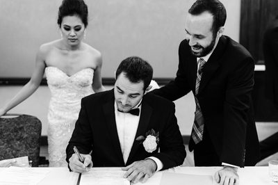 A Groom Signing The Marriage License at Hyatt Valencia