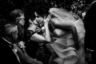Bride Kisses Mom at Ceremony